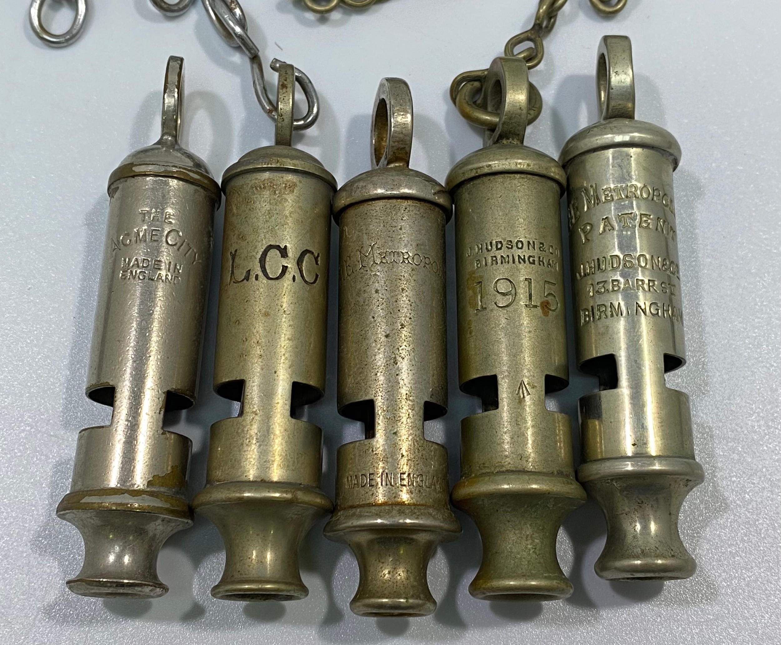 Six various whistles including LCC, a 1915 dated example with chain and button hook, ACME - Image 2 of 2