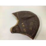 A WWII US Navy pilot's brown leather flying helmet/cap, with sheeps wool lining, (a/f)