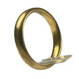 A 22ct yellow gold wedding band, weighing 5.2 grams, finger size Q.