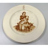 A National Socialist People's Welfare pottery plate, printed underglaze in monochromatic sepia