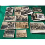 Probably a unique collection of approximately 60 World War Two photographs of various sizes, which