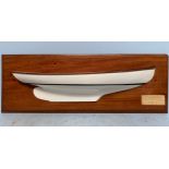 A white-painted wooden half block model of 'X' One Design yacht hull by Mr Westmacott, 1925, 66cm