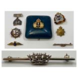 A gold and enamel Naval brooch, tests as 14/15ct, 5.4g, together with three silver Naval brooches