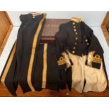 A Royal Navy Commander's No 1 Ceremonial Dress coat and tails together with two pairs of trousers,
