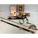 A naval officer's dress sword, 32" blade with 3/4 fuller burnished Arabesque decoration with crowned