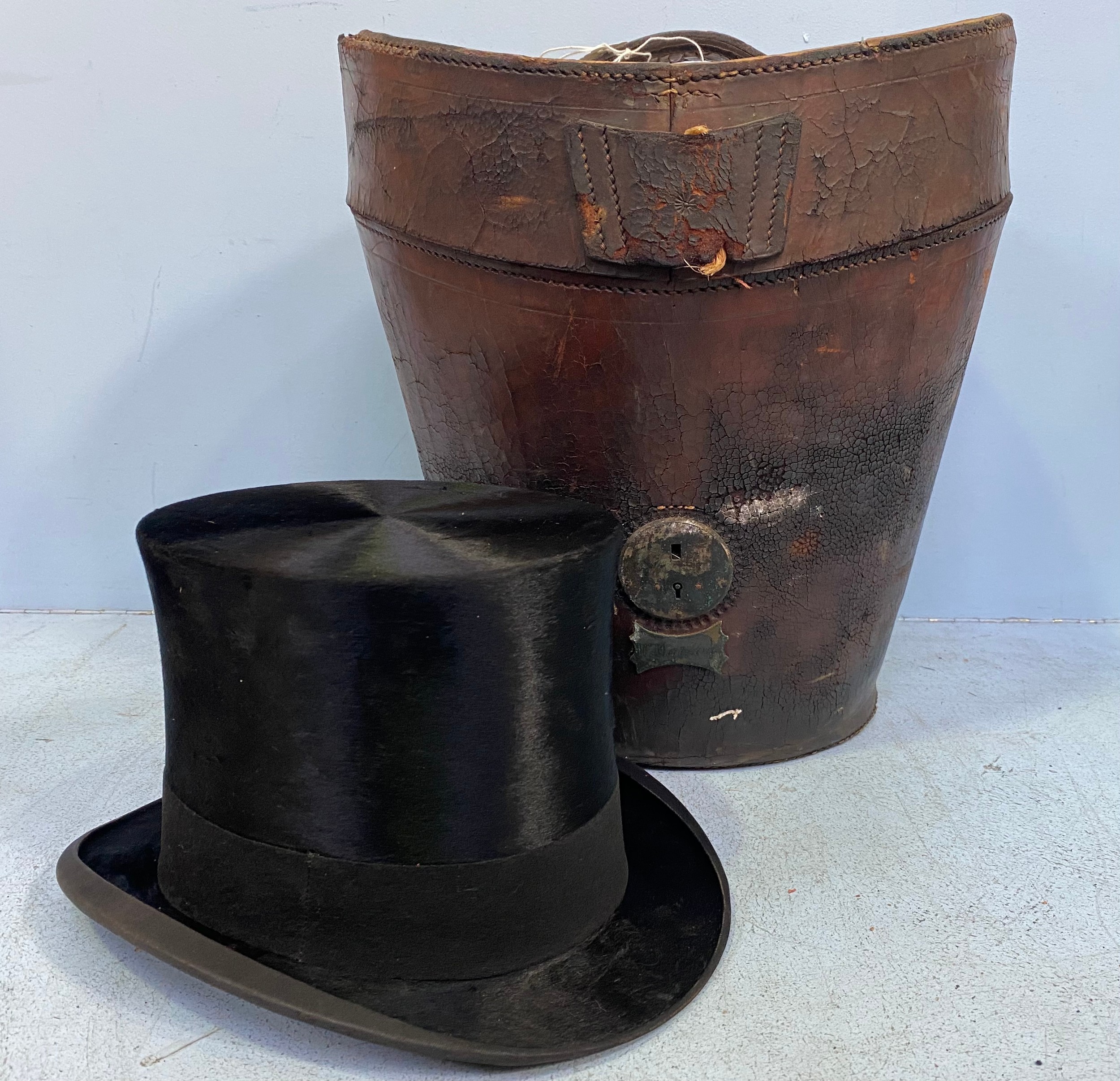 A vintage black silk top hat by Andre & Co. Ltd. Hatters, 163 Piccadilly, W. Andres Superfine,