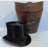 A vintage black silk top hat by Andre & Co. Ltd. Hatters, 163 Piccadilly, W. Andres Superfine,