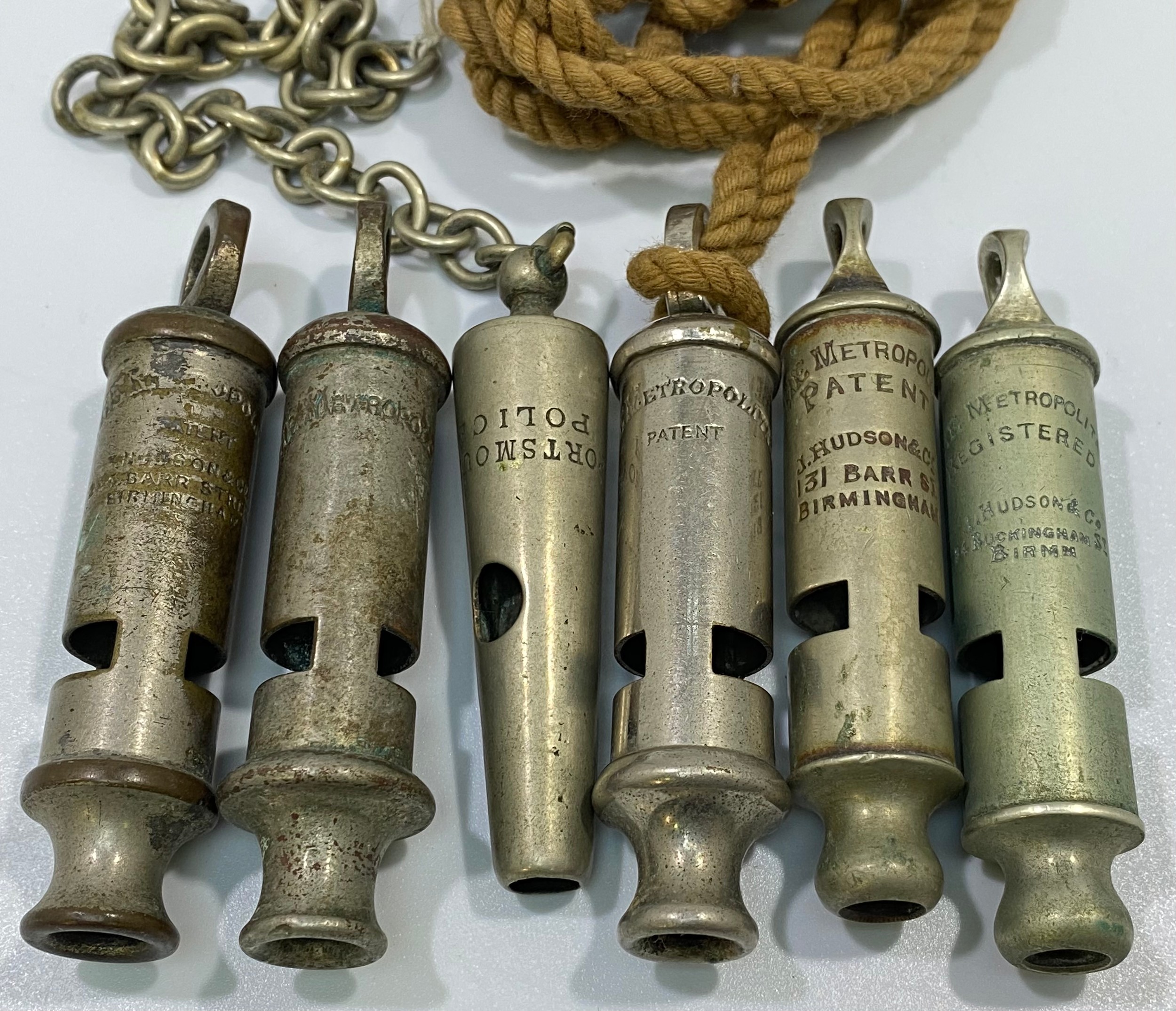 Six various whistles including 'Portsmouth Police' and 5x Metropolitans, one leather pouch (6) - Image 2 of 3