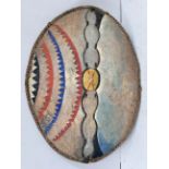 An unusual Maasai shield, Kenya, hide with painted with red, white, blue, black and yellow geometric