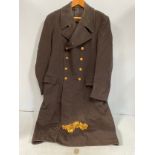 A Royal Navy Greatcoat with brass Naval buttons, together with approx. 55 loose Naval buttons