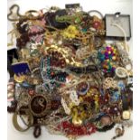 A large quantity of costume jewellery including Hollywood, brooches, bracelets, necklaces and