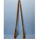A pair of wooden boat oars, 182cm