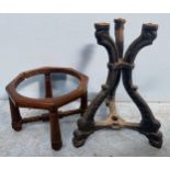 A 19th century cast iron tripod binnacle stand, 38 cm high, together with a stained beechwood