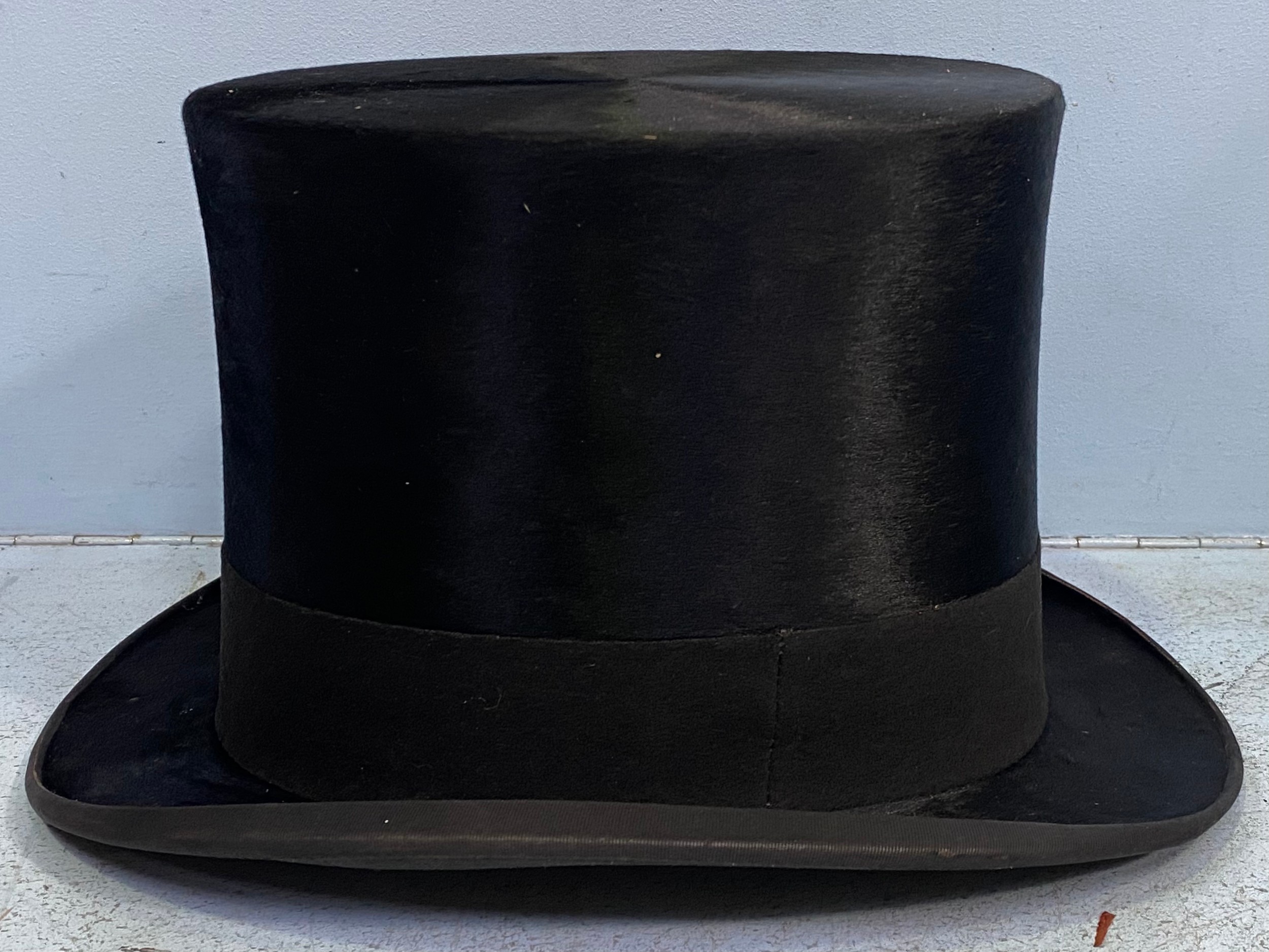 A vintage black silk top hat by Andre & Co. Ltd. Hatters, 163 Piccadilly, W. Andres Superfine, - Image 4 of 8