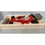 A Toschi promotional model of a Ferrari Formula 1 car with a bottle of Nocino liqueur, 70cm long,