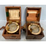 Two various brass Adnirlaty Pattern Medium Landing Compasses, in fitted wooden protectve storage