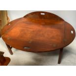 A mahogany ship steward's or butler's folding tray-top low table, 80x105cm