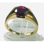 A 9ct yellow gold dress ring, set with a round faceted garnet, ring weighs 3.7 grams, finger size Q
