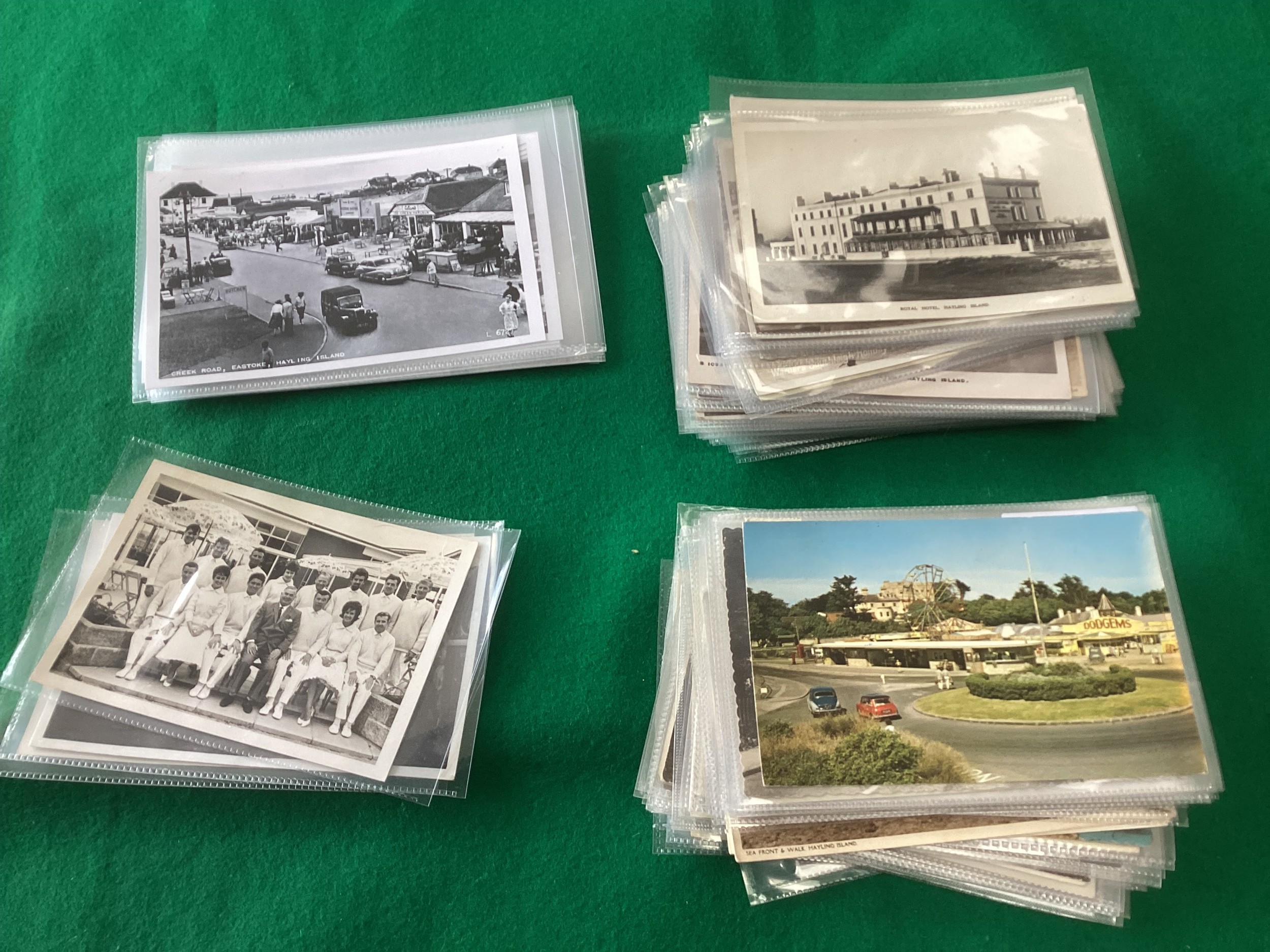 Approximately 90 standard-size postcards – most in plastic sleeves - of Hayling Island from