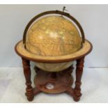 A decorative 'old world' terrestrial globe, the Atlas dedictaed to Cardinal Nicolo, with brass