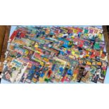 Approximately 120 DC & Marvel comics from the 90s, half in plastic slip covers, together with 130