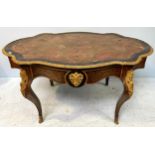 A Victorian ebonised and red tortoiseshell, Boulle worked, shaped oval centre table, with gilt-metal