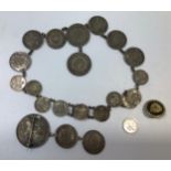 A late 19th century silver coin necklace and matching pendant coin brooch made from Brazilian .971