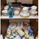 Two shelves of mixed ceramics including a large Devon Fieldings lustre bowl, an Italian blue glass