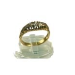 A yellow metal ring, possibly 18ct, set with 4 x Victorian cut diamonds, estimated total weight of