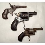 Two 19th century top-vented starting pistols with revolving six-shot magazines, and a top-vented