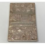 A William IV silver castle top card case by Taylor & Perry, the front decorated in relief with a