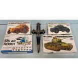 Three various Tamiya model kits of military vehicles together with a Smart Science Solar Robot and a