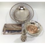 A silver-plated oval breadbasket, with wirework rim, a pierced bon-bon dish, a silver-plated