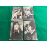 Four pornographic World War One era postcards - three showing two women engaged in Lesbian acts, one