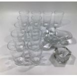 A set of twelve Baccarat crystal, small tapered tumblers, 9cm tall, together with a heavy Baccarat
