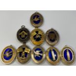 Nine various silver gilt Masonic collar jewels with blue enamelling including Surrey (inscribed
