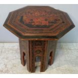 A 20th century Burmese painted black lacquered octagonal occasional table, 46cm, wide, together with