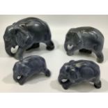 Four graduated Langley pottery blue glazed elephants, designed by Frederick Braddon, 1931-39,
