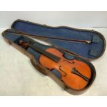 A full size violin with paper label reading ‘Fabrique d’Instruments De Musique, P. Beuscher, 19,