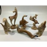 A complete set of six Oake's period Langley pottery animals, c1959, with light brown glaze, the