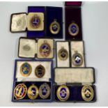 Thirteen various silver gilt Masonic collar jewels with blue enamelling including a red and blue