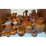 A good quantity of 19th century Original Langley Ware or 'Chocolate Ware' pottery including jugs,