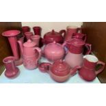 A quantity of Lovatts Langley Ware 'Pink' glazed pottery including three various teapots, coffee