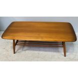An Ercol stained elm coffee table, 104cm