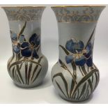 A pair of Lovatt Langley Mill art pottery vases, c1914, carved, gilded and painted with Blue Iris to