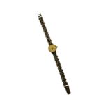 A 9ct gold lady’s Geneve cocktail watch with 9ct gold bracelet, weighing 14.9 grams gross.