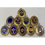 Ten various silver gilt Masonic collar jewels with blue enamelling including London (inscribed verso