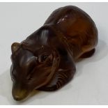 A Lalique amber glass figure of a recumbent bear cub, with etched mark to base, 10cm long