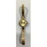 A ladies 18ct gold Rolex Orchid wristwatch, the gold dial with batons denoting hours, on 18ct gold