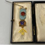 A 9ct gold Masonic jewel for Paton Lodge No. 3738 and bar ‘W.M. 1973-1974’ with poppy badge on